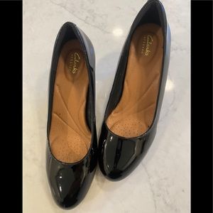 Clarks black patent leather pumps. Only worn a couple of times. Look new!